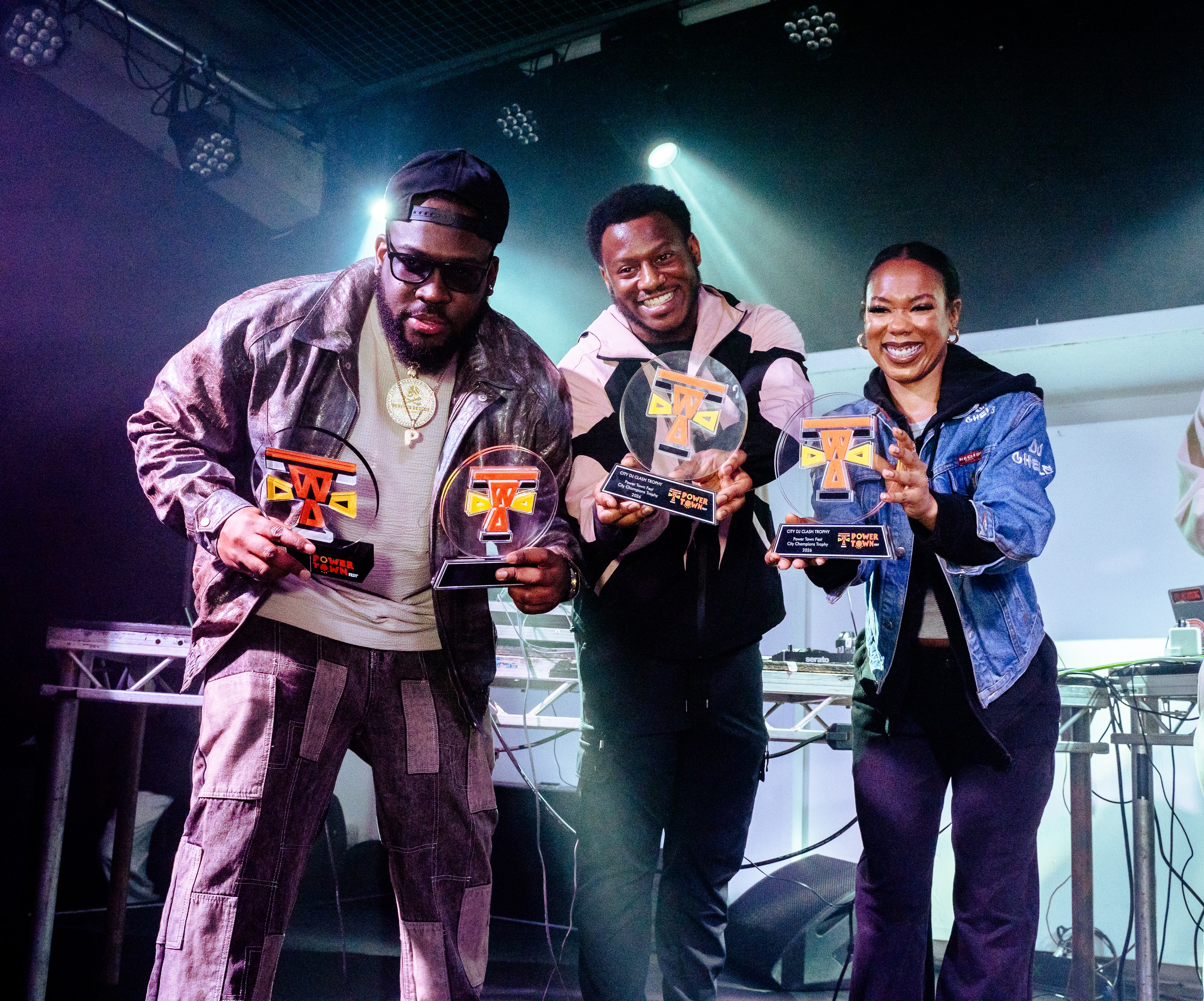 DJ Prime holding the City DJ Clash trophy at Power Town Festival